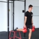 Sean weight training with kettlebells